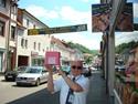 In Germany - In downtown Landstuhl with friend (and great pizza sign)